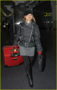 Tila Tequila in skirt, stockings @ JFK Airport 